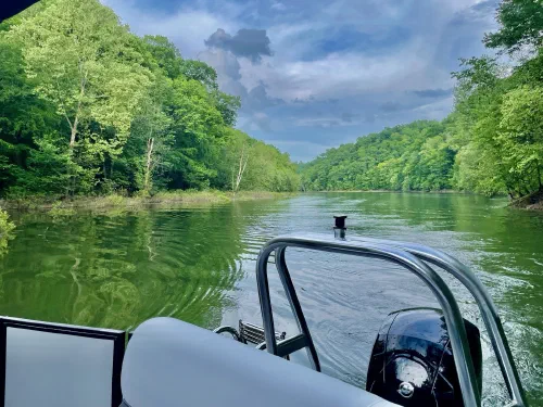 Open water and wooded shores from the stern